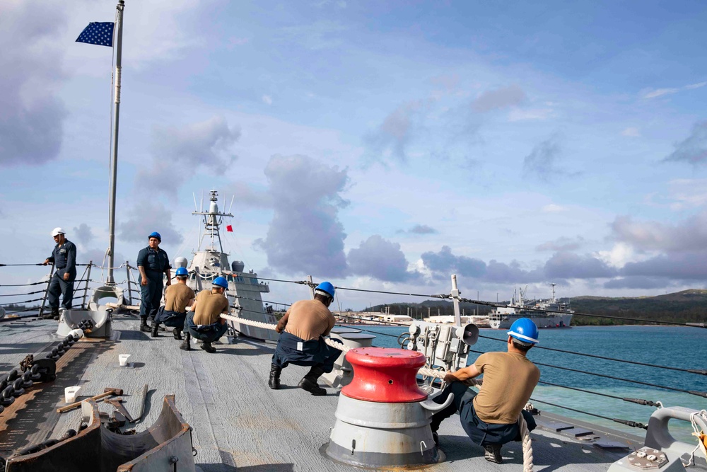 The USS Ralph Johnson (DDG 114) pulls into Guam.