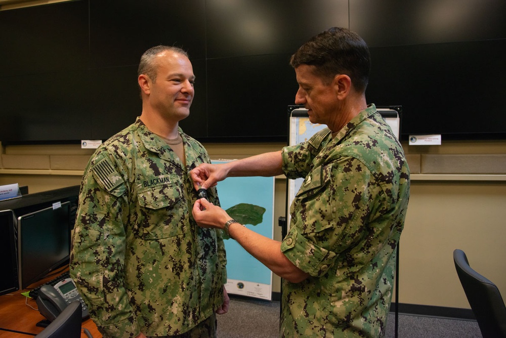 Newly promoted Commander Adam Blackman