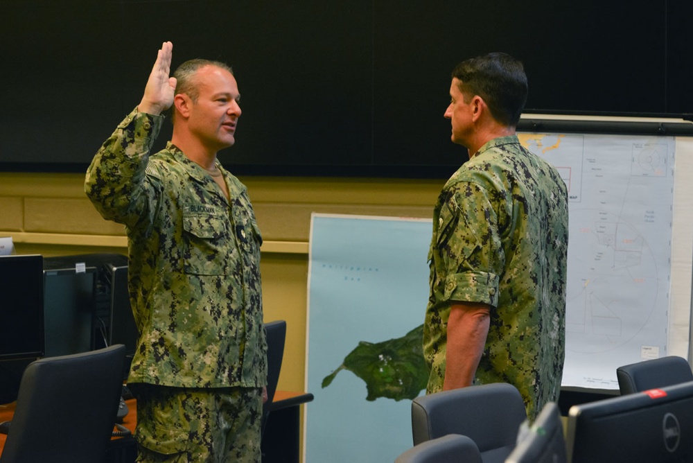 Lt. Cmdr. Adam Blackman takes the Oath of Office