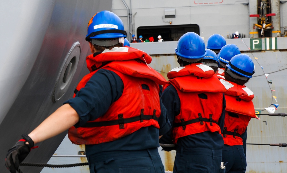 USS Robert Smalls (CG 62) Sailors Hold the PND line during RAS