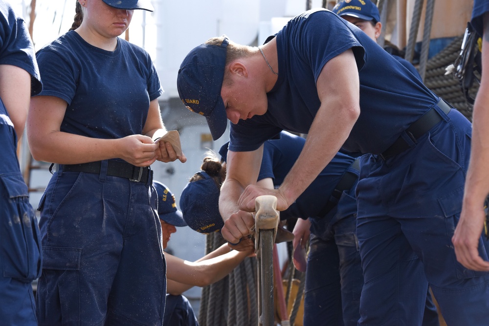 USCGA Cadet participates in work on deck