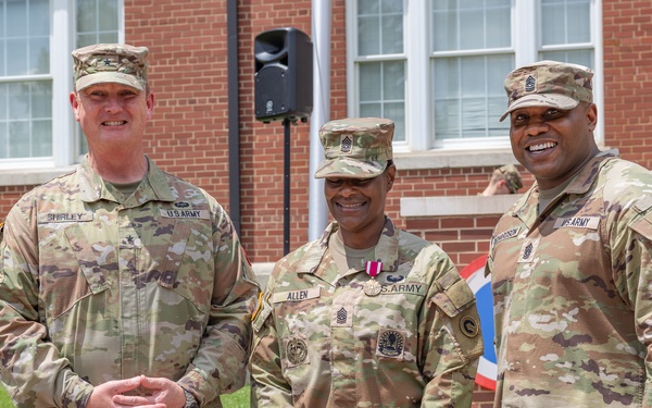CSM Allen stands with BG Shirley and CSM Richardson after promotion to CSM