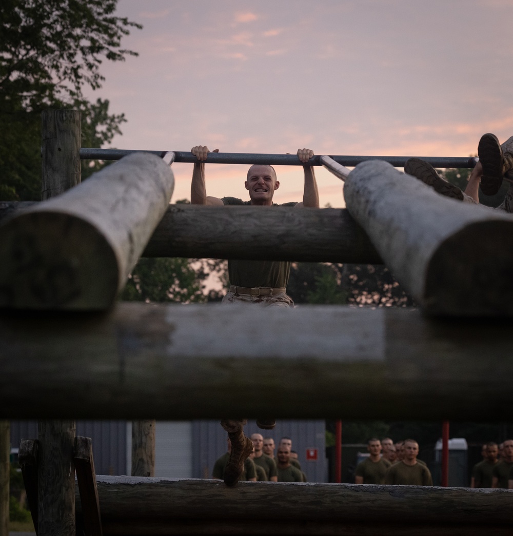 Officer Candidates compete in a timed obstacle course at the Officer Candidate School