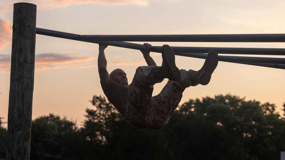 Officer Candidates compete in a timed obstacle course at the Officer Candidate School