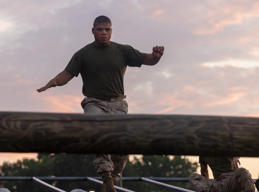 Officer Candidates compete in a timed obstacle course at the Officer Candidate School