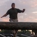 Officer Candidates compete in a timed obstacle course at the Officer Candidate School