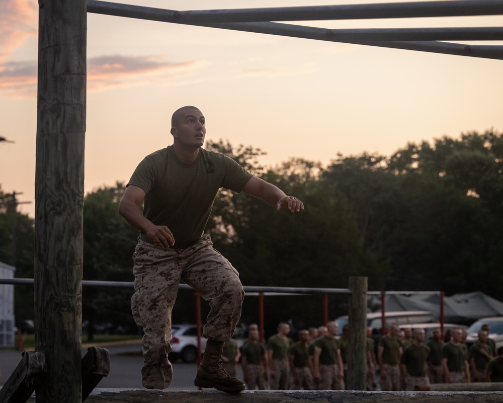 Officer Candidates compete in a timed obstacle course at the Officer Candidate School