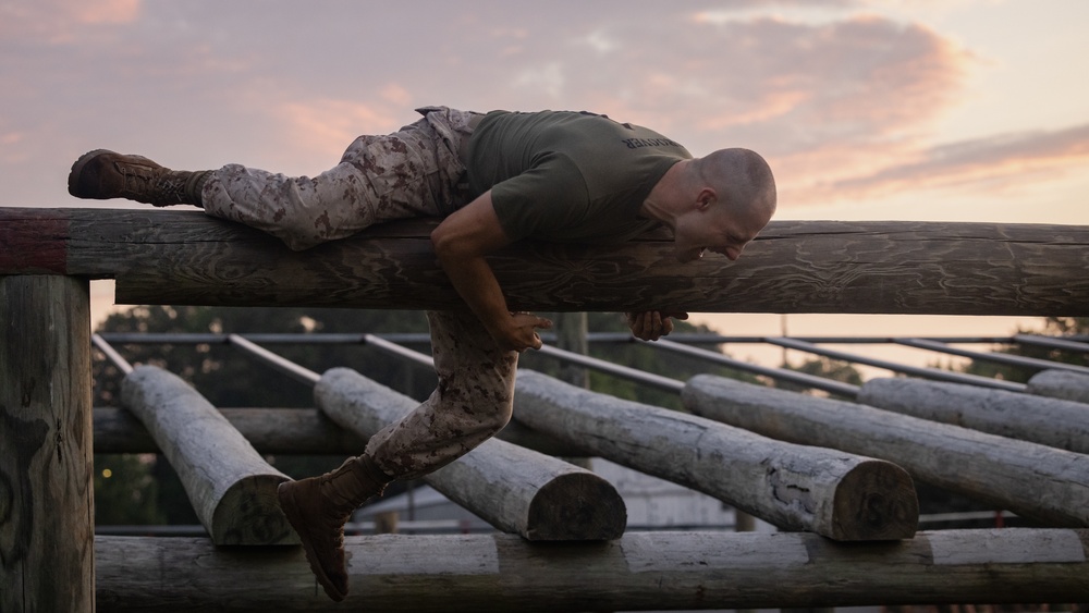 Officer Candidates compete in a timed obstacle course at the Officer Candidate School