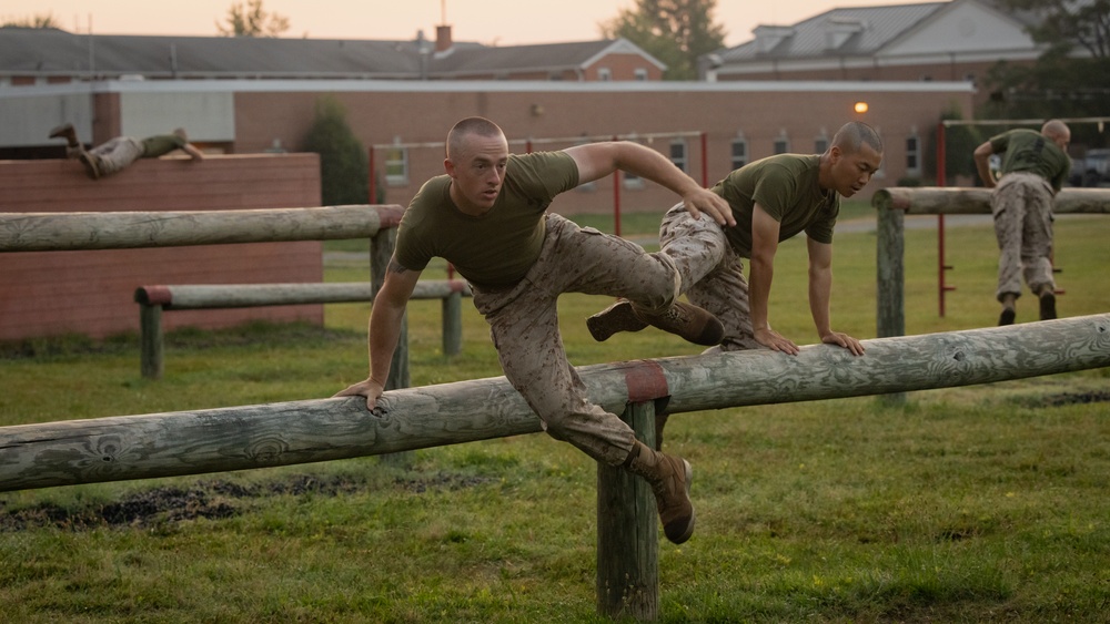 Officer Candidates compete in a timed obstacle course at the Officer Candidate School