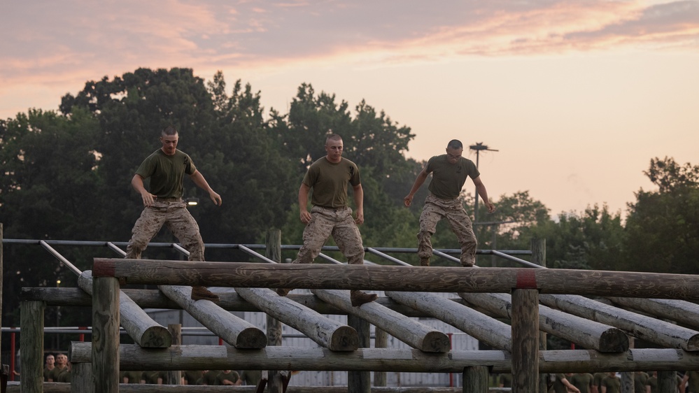 Officer Candidates compete in a timed obstacle course at the Officer Candidate School