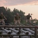 Officer Candidates compete in a timed obstacle course at the Officer Candidate School