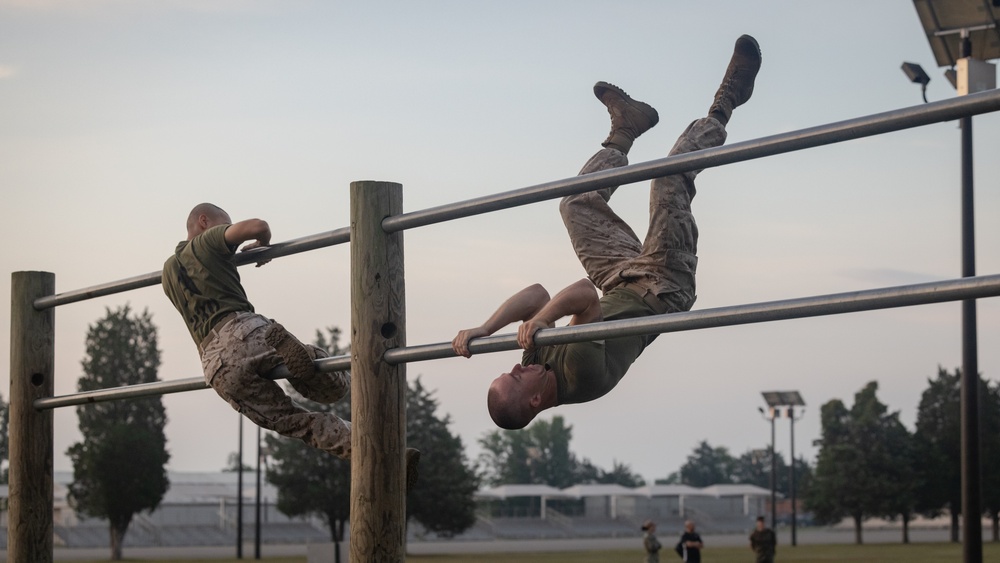 Officer Candidates compete in a timed obstacle course at the Officer Candidate School