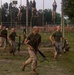 Officer Candidates compete in a timed obstacle course at the Officer Candidate School