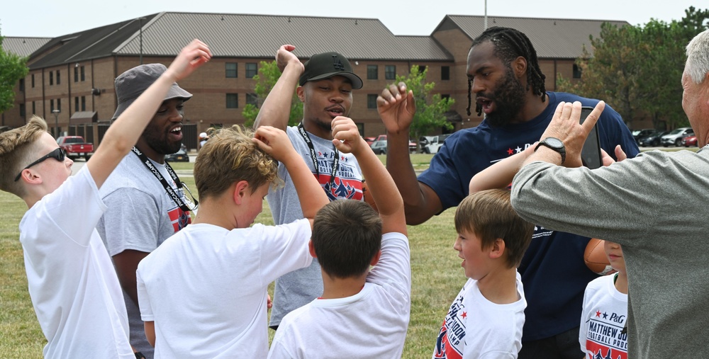 NFL Pro Camp runs drills with Department of Defense dependents