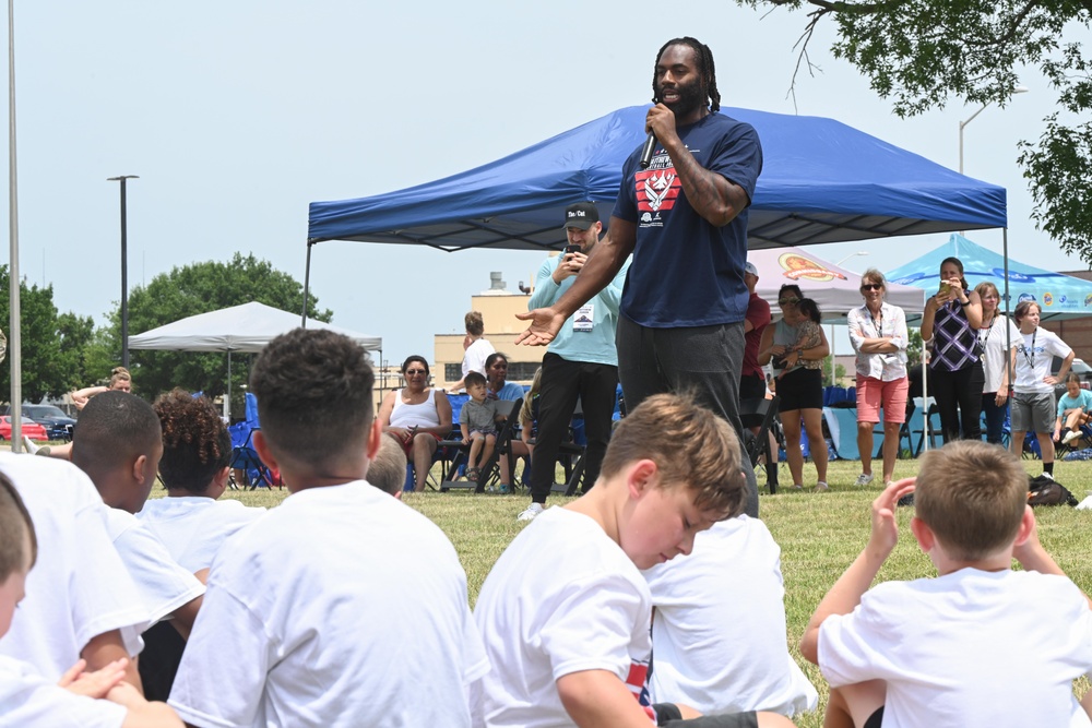 NFL Pro Camp runs drills with Department of Defense dependents