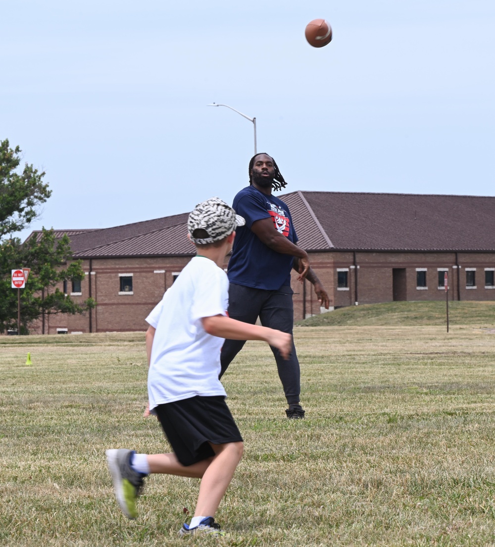 NFL Pro Camp runs drills with Department of Defense dependents