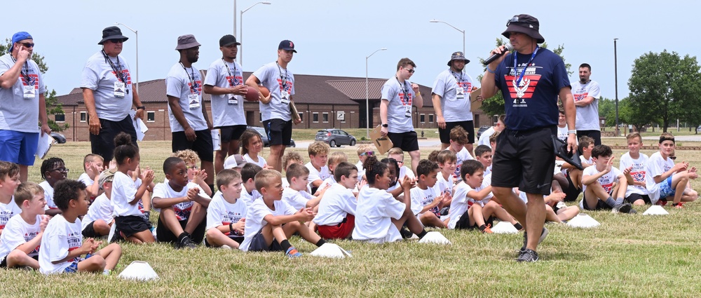 NFL Pro Camp runs drills with Department of Defense dependents