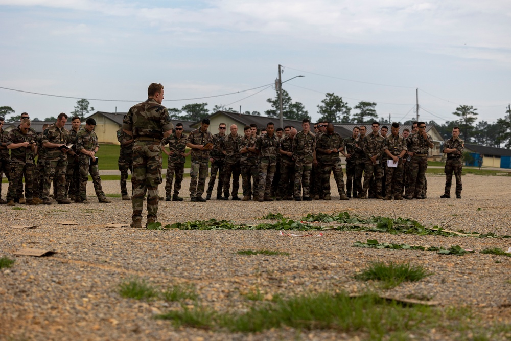 French soldiers conduct a direct action raid during Exercise Raven