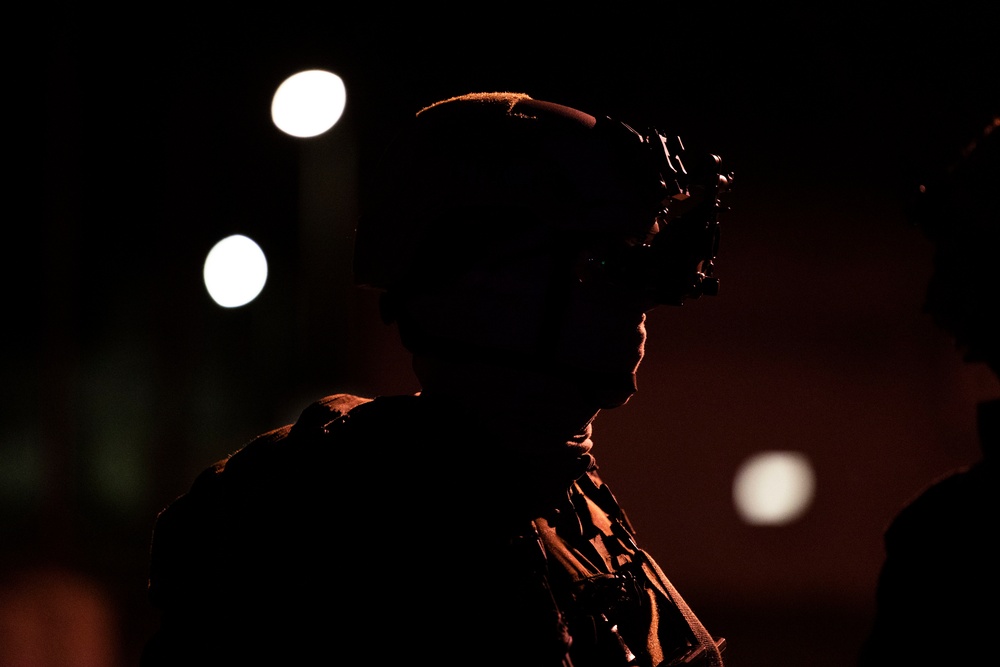 French soldiers conduct a direct action raid during Exercise Raven