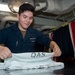 USS Ronald Reagan (CVN 76) Sailors provide laundry services