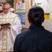 USS Rafael Peralta (DDG 115) holds a catholic service on the mess decks