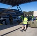 U.S. Marines and Australian Airmen load Missiles on Joint Strike Fighters together  