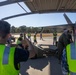 U.S. Marines and Australian Airmen load Missiles on Joint Strike Fighters together  