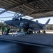 U.S. Marines and Australian Airmen load Missiles on Joint Strike Fighters together  