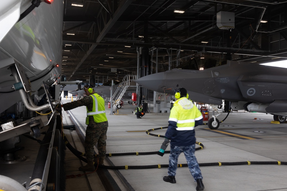 U.S. Marines and Australian Airmen Refuel F-35s Together 