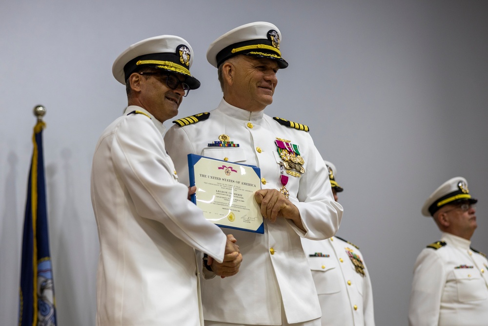 Capt. Grant Wallace relinquishes command to Capt. Daniel Clark