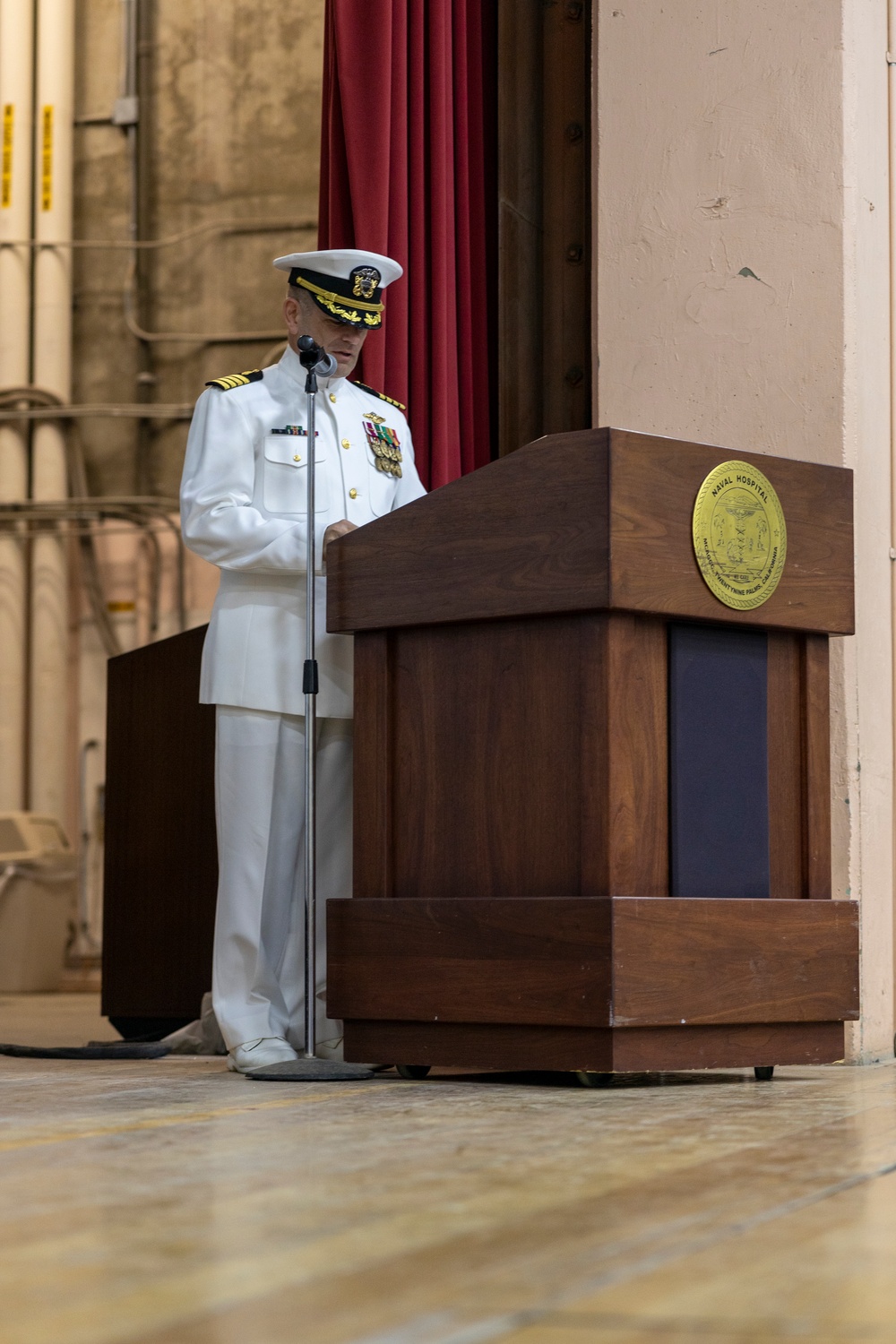 Capt. Grant Wallace relinquishes command to Capt. Daniel Clark
