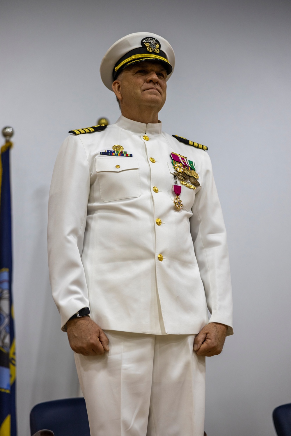 Capt. Grant Wallace relinquishes command to Capt. Daniel Clark