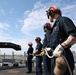 Bataan Sailors man the Rails