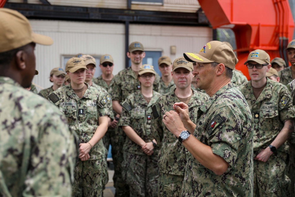 CSG 7 holds quarters on the pier with USS Michigan (Blue)