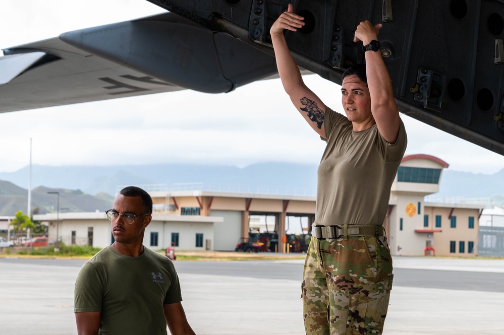 Airmen partnered with U.S. Marine Corps to load a C-17 Globemaster