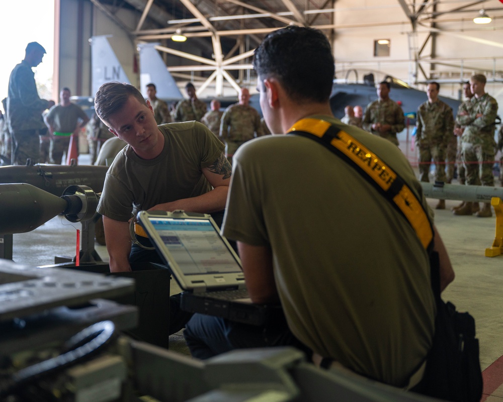 Munitions in motion; Load crew comp