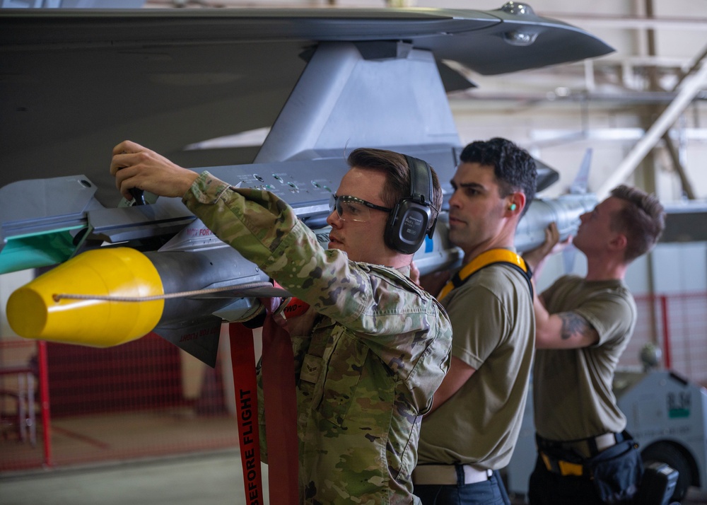 Munitions in motion; Load crew comp