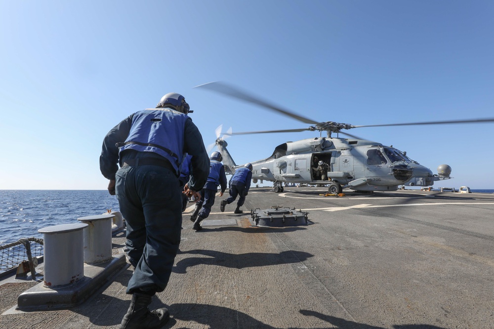 Sailors Run To Secure Helicopter