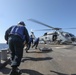 Sailors Run To Secure Helicopter