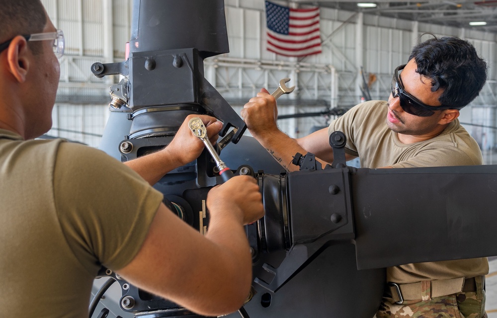 Rescue maintainers perform Pave Hawk repairs