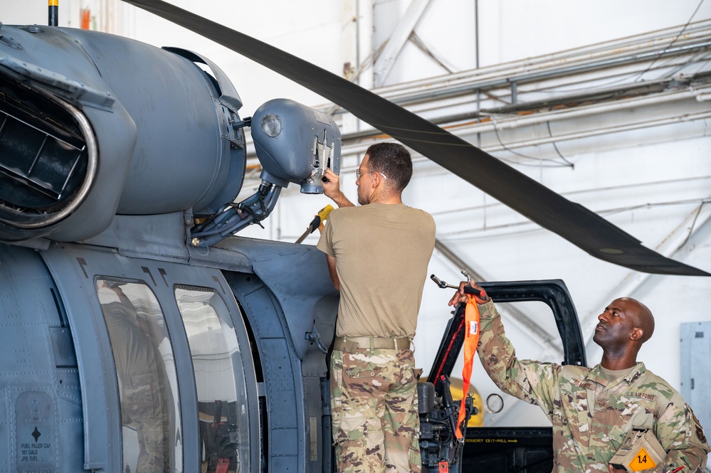 Rescue maintainers perform Pave Hawk repairs