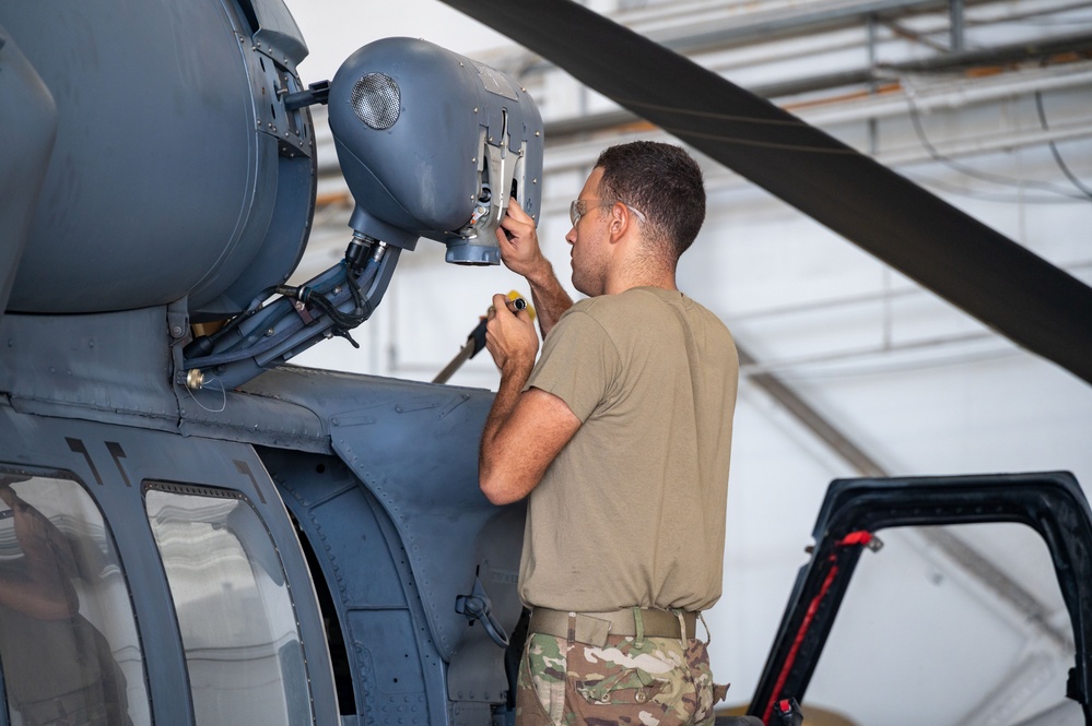 Rescue maintainers perform Pave Hawk repairs