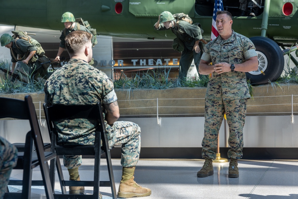 U.S. Marine Corps Capt. Connor McNamara relieves Capt. Moses Menchaca, outgoing company commander during Headquarters Company Change of Command Ceremony at the National Museum of the Marine Corps