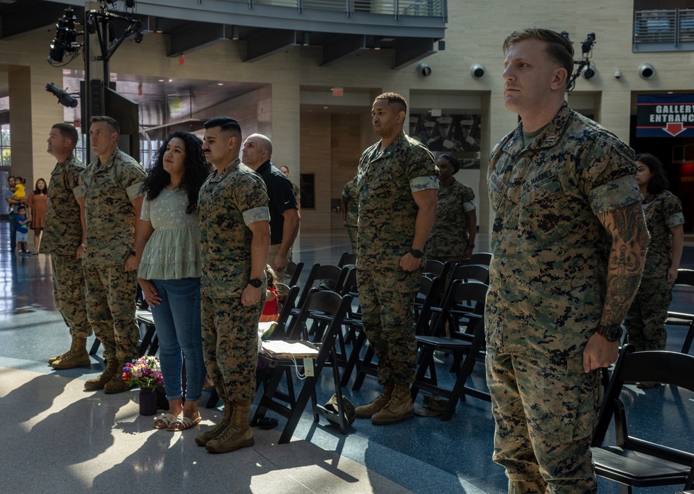 U.S. Marine Corps Capt. Connor McNamara relieves Capt. Moses Menchaca, outgoing company commander during Headquarters Company Change of Command Ceremony at the National Museum of the Marine Corps