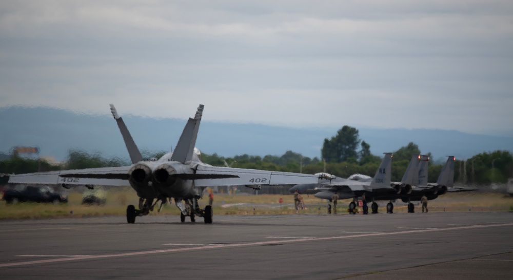 123rd FS conducts DACT with 194th FS and the U.S. Navy's VFA-136