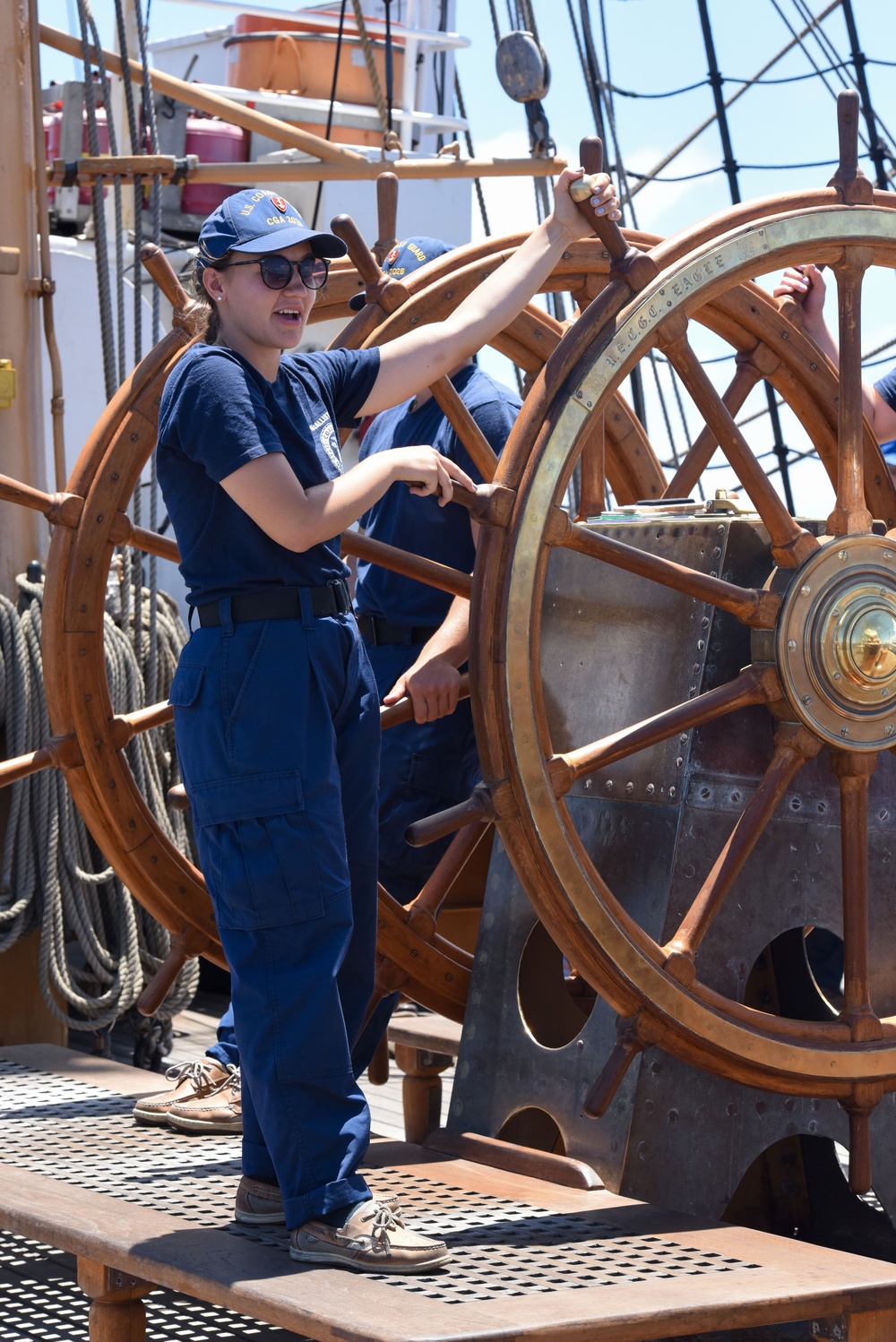 USCGA Cadet at USCGC Eagle's helm