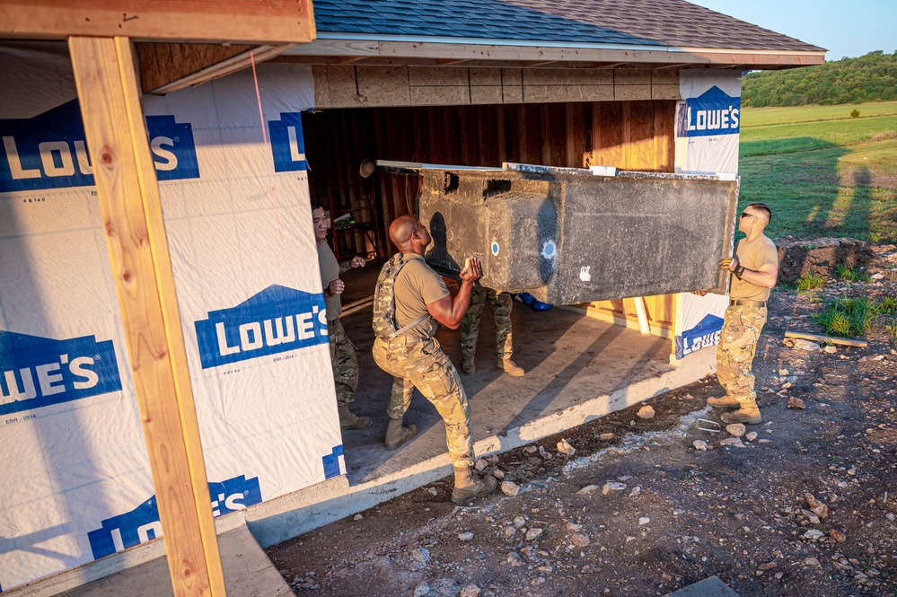 103rd Engineers help build houses for disabled native veterans