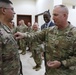 Task Force Liberty Soldiers promote, re-enlist at Qatar embassy ceremony