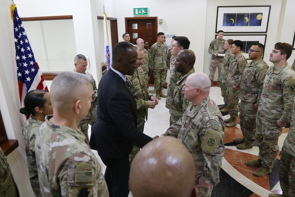 Task Force Liberty Soldiers promote, re-enlist at Qatar embassy ceremony