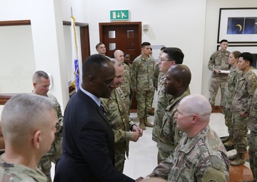 Task Force Liberty Soldiers promote, re-enlist at Qatar embassy ceremony